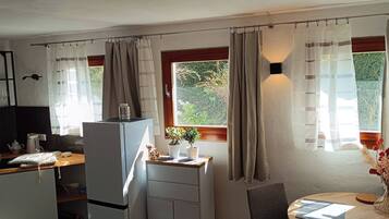 Fridge, stovetop, coffee/tea maker, cookware/dishes/utensils