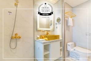 Shower, jetted bath, hair dryer, bidet