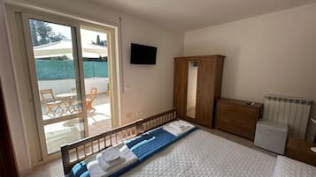 1 habitación, acceso a internet y ropa de cama