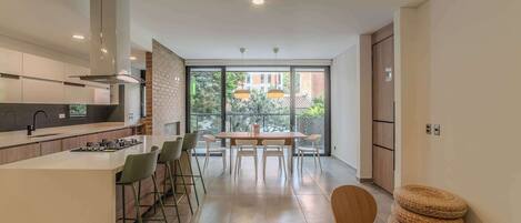 Fridge, microwave, stovetop, coffee/tea maker