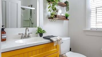 Shower, eco-friendly toiletries, hair dryer, towels