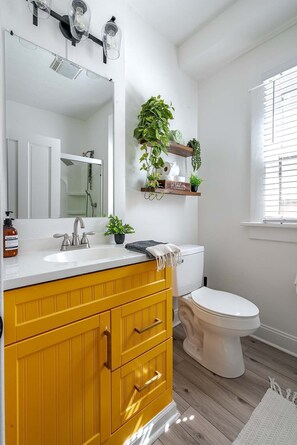 Shower, eco-friendly toiletries, hair dryer, towels