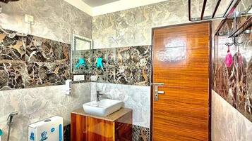 Premium Double Room, Balcony, City View | Bathroom | Shower, hair dryer, towels, soap