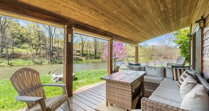 Riverside retreat with hot tub, scenic views, rustic charm & open-plan luxury – perfect escape!
