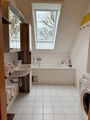 Hair dryer, towels, soap, shampoo