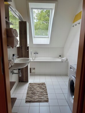 Hair dryer, towels, soap, shampoo