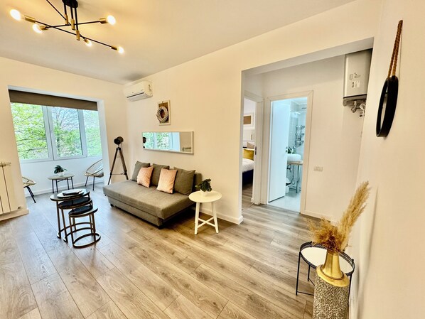 City Apartment, Park View | Living area | 80-cm LED TV with digital channels