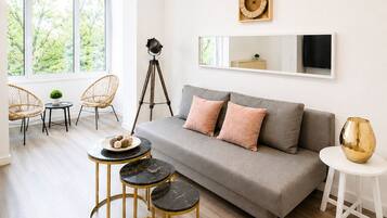 City Apartment, Park View | Living area | 80-cm LED TV with digital channels