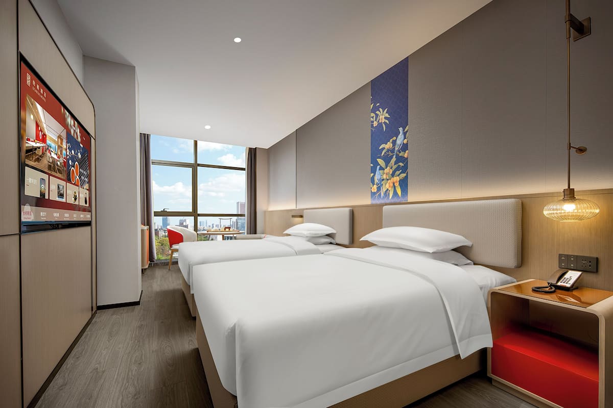 Memory-foam beds, desk, laptop workspace, blackout curtains