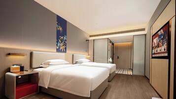 Memory foam beds, desk, laptop workspace, blackout drapes