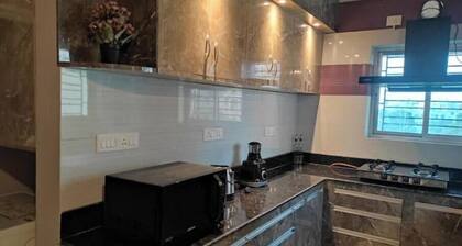 Stylo Stays 3 mins drive from Biswa Bangla Gate