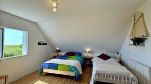 4 bedrooms, iron/ironing board, travel cot, WiFi