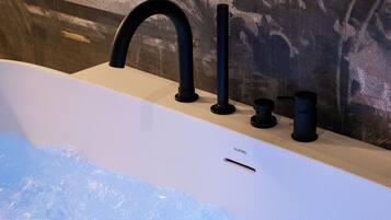 Shower, jetted bath, hair dryer, bidet