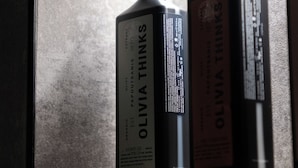 Two bottles of shower gel in a bathroom. - Trullo delle Sfere, Luxury Trullo in the center of Alberobello (Alberobello)