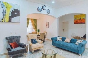 Economy Apartment, Balcony, City View | Living area - HEIK APARTMENT (Abuja)
