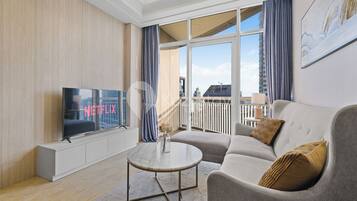 Departamento, 2 habitaciones, vista a la ciudad | Área de sala de estar