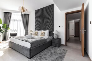 Luxury Apartment, 2 Bedrooms, Partial Sea View | 2 bedrooms, desk, laptop workspace, blackout drapes