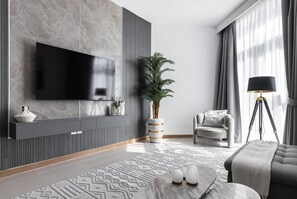 Luxury Apartment, 2 Bedrooms, Partial Sea View | Living area | 45-inch Smart TV with digital channels, Netflix, streaming services