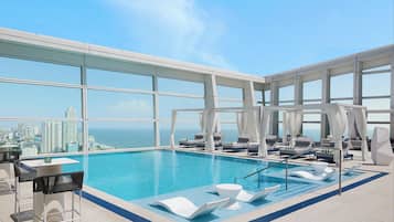 Outdoor pool, free pool cabanas, pool umbrellas