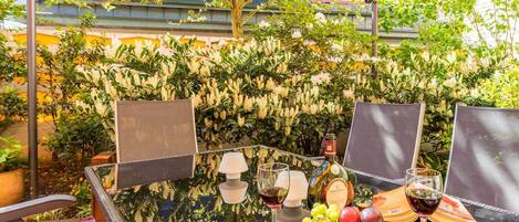 Superior Suite, Garden Area | Terrace/patio