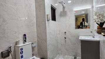 Superior Studio, City View | Bathroom | Shower, free toiletries, slippers, towels