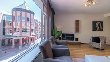 Comfort Apartment | Living area | Flat-screen TV