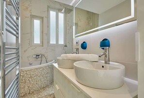 Shower, hair dryer, shampoo