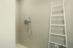 Shower, hair dryer, shampoo