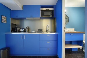 Fridge, microwave, stovetop, coffee/tea maker