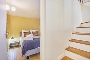 2 habitaciones, tabla de planchar con plancha, cuna de viaje y wifi 