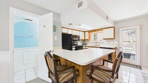 Microwave, stovetop, dishwasher, coffee/tea maker