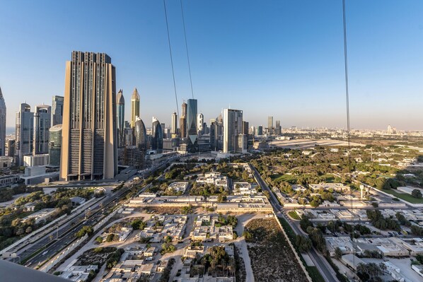 A cityscape with modern high-rise buildings, a well-planned urban layout, and a mix of commercial and residential areas.