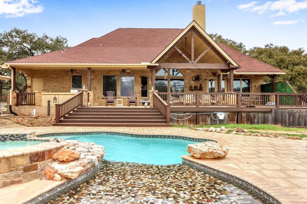 Private pool with outdoor seating 