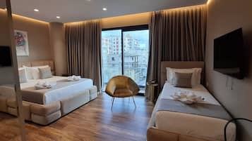 Comfort Triple Room, Balcony, City View | Desk, blackout drapes, free WiFi, bed sheets