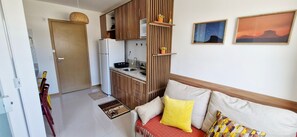 Comfort Apartment | Living area | 40-inch Smart TV with digital channels, Netflix, streaming services
