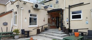A building with a sign reading "Sky & BT Sports" and a sign welcoming visitors to the "Beer Garden". - New Accommodation  (Alfreton)