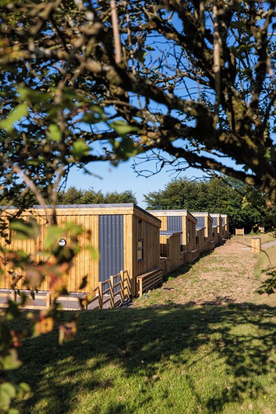Escape to nature - stunning group lodges overlooking Wistlandpound Reservoir