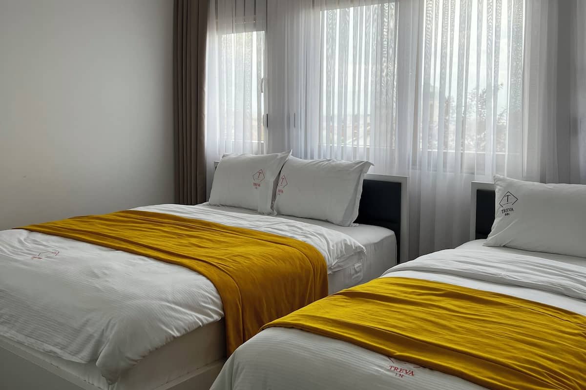 Departamento Deluxe | 3 habitaciones, caja de seguridad en la habitación y escritorio