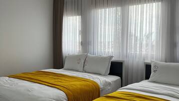 In-room safe, desk, blackout curtains, soundproofing