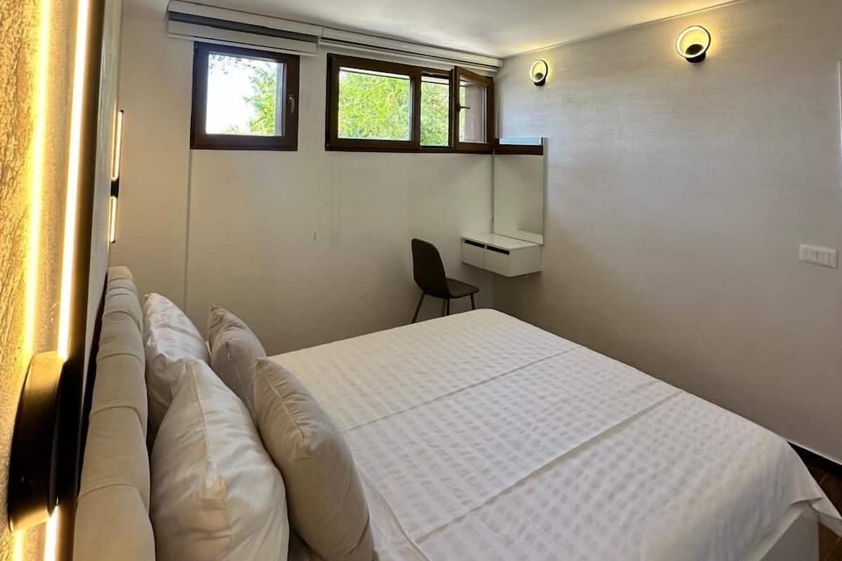 Departamento Deluxe | 3 habitaciones, caja de seguridad en la habitación y escritorio