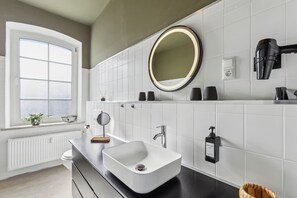 Hair dryer, towels, soap, shampoo