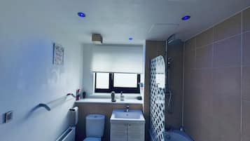 Eco-friendly toiletries, hair dryer, bathrobes, slippers