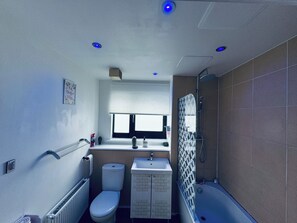 Eco-friendly toiletries, hair dryer, bathrobes, slippers
