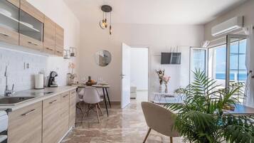 Apartment, Sea View | Private kitchen | Full-size fridge, oven, stovetop, espresso maker