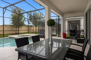 Outdoor dining - Last Minute Disney Getaway! Luxury Villa with Private Pool. Book Now! #115453 (Orlando)