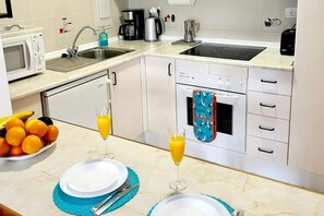 Apartment | Private kitchen | Fridge, microwave, oven, stovetop