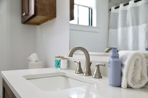 Hair dryer, towels, soap, shampoo