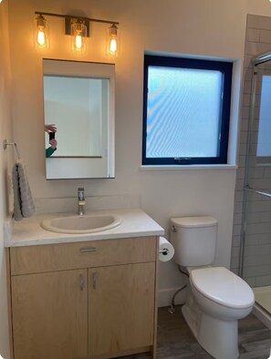 Shower, hair dryer, towels, soap - Bright & Modern 2-Bedroom Duplex, Central Missoula (Missoula)