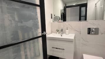 Shower, towels, soap, shampoo