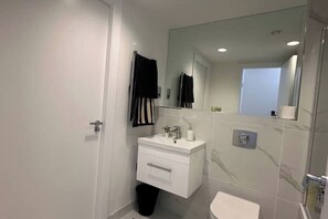 Shower, towels, soap, shampoo